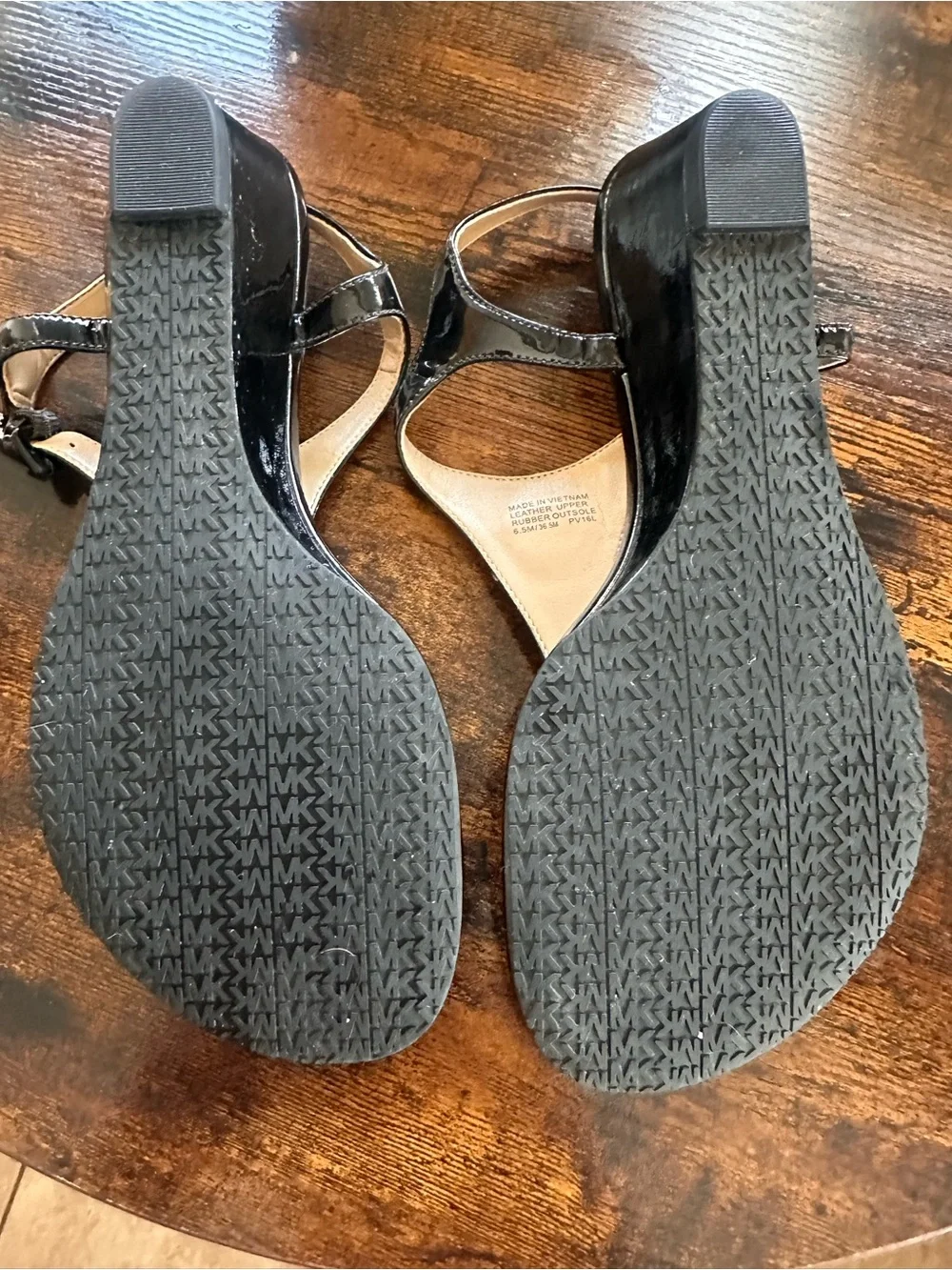 Michael Kors Black Patent T-Strap Sandals with Logo Medallion